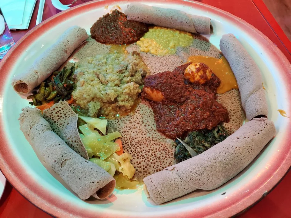 Habesha Special - Our signature combination platter featuring a curated selection of our most popular meat and vegetable dishes, perfect for sharing.